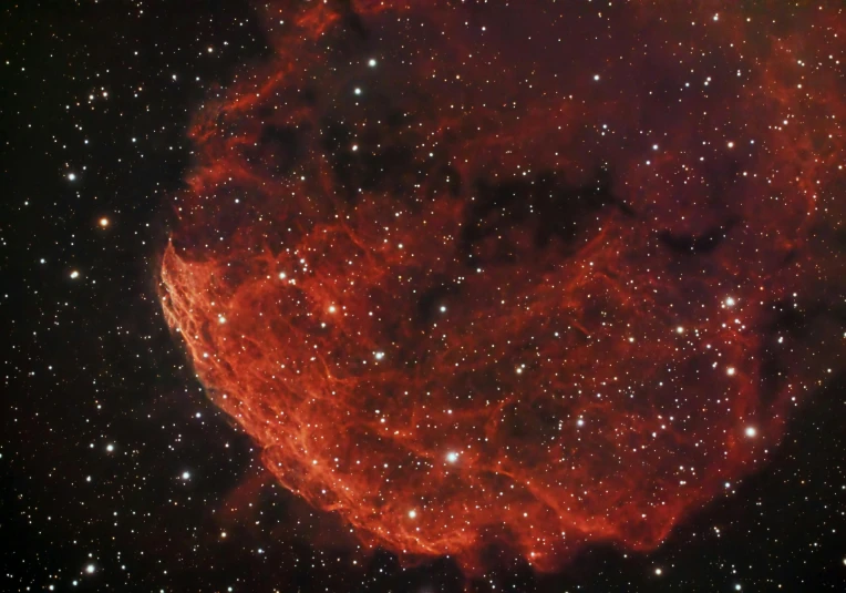 the star forming its own giant bubble in a dark background