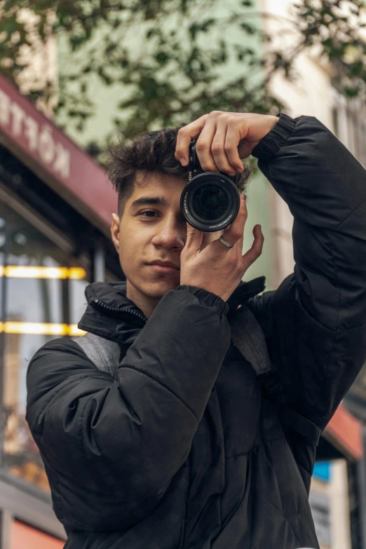 a man taking a pograph with his camera