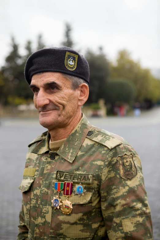 an older man with a military uniform