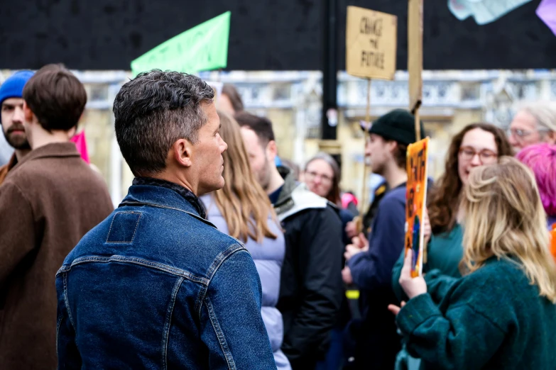 a man standing in front of a group of people