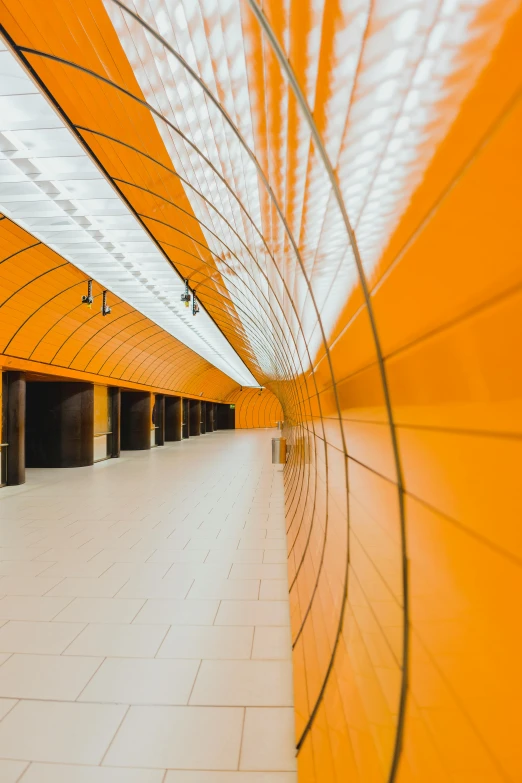 the interior of an empty, modern building with bright yellow walls