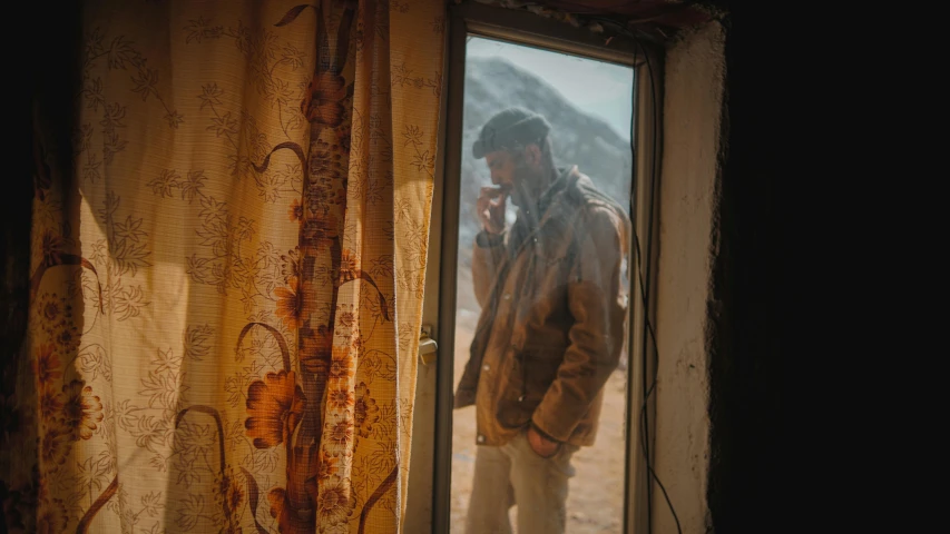 a person standing in front of an open window