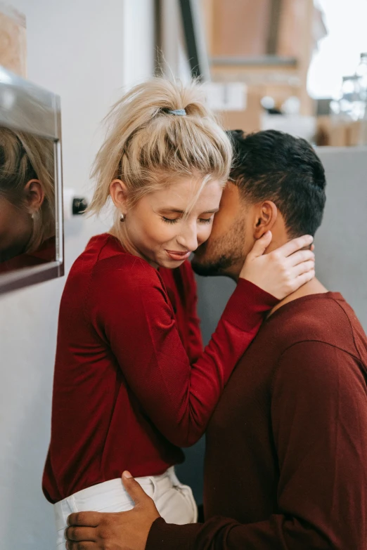 a couple emcing each other in a studio