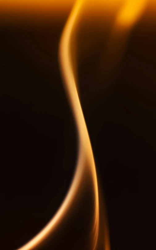 a picture of a black background with light and orange