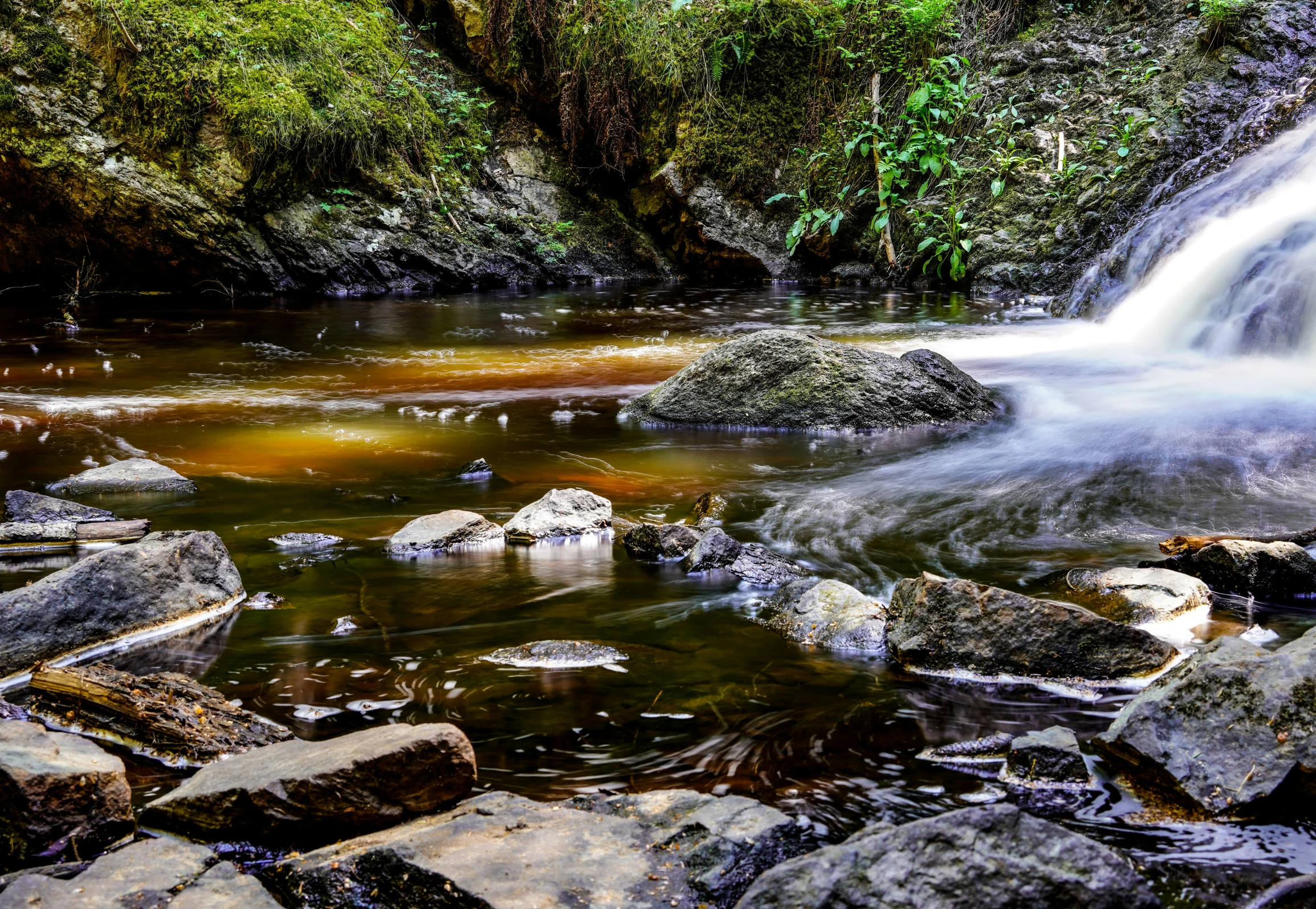 the water has just poured over rocks and gravel