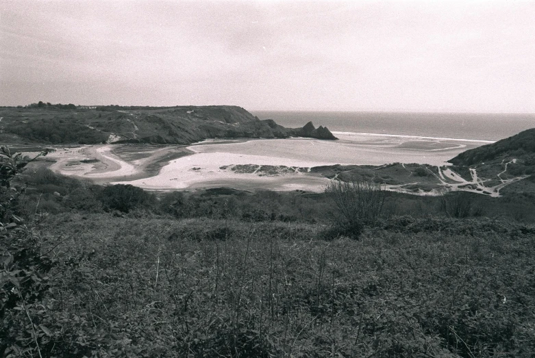 black and white po of water in the distance