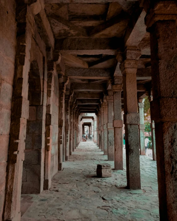 there is a long hallway in the side of this building