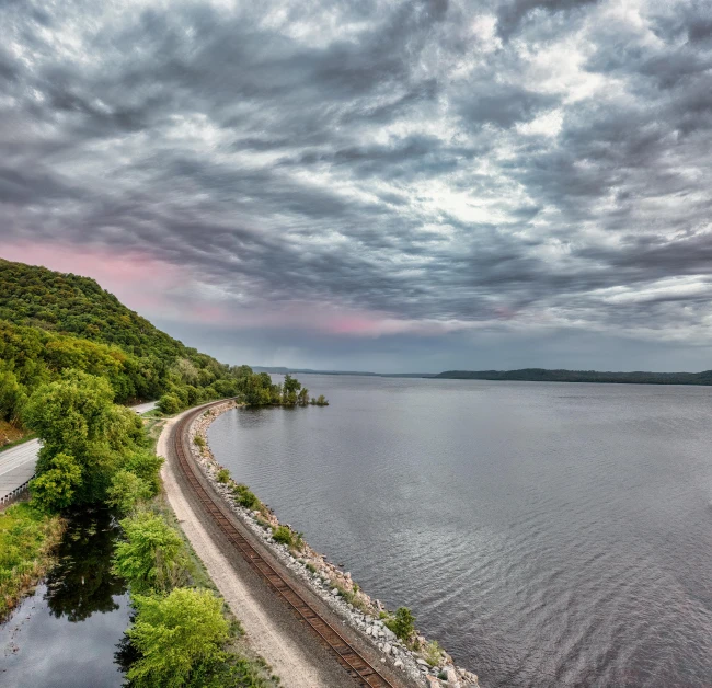 an incredible scene overlooking a lake and forest