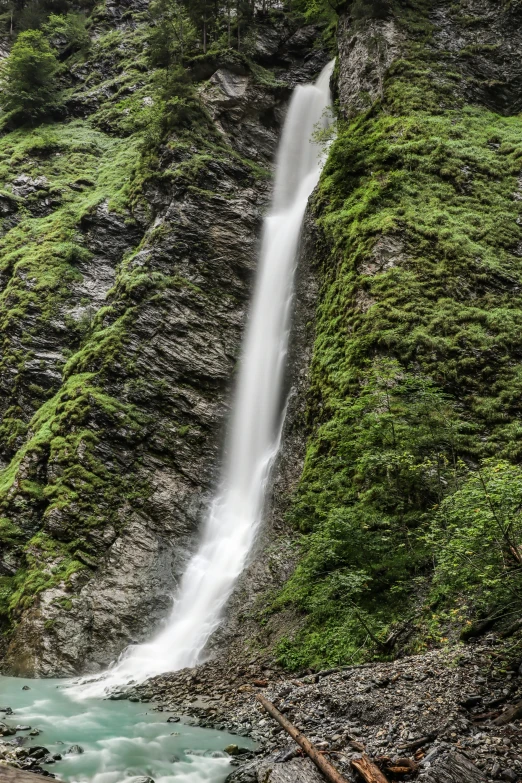 a small waterfall in the mountain side