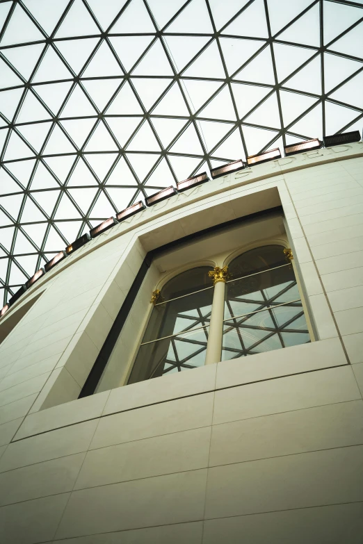 an elevated view of the glass roof of a building