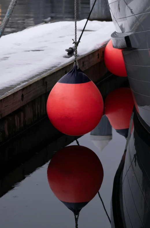 a boat sitting on the side of the water