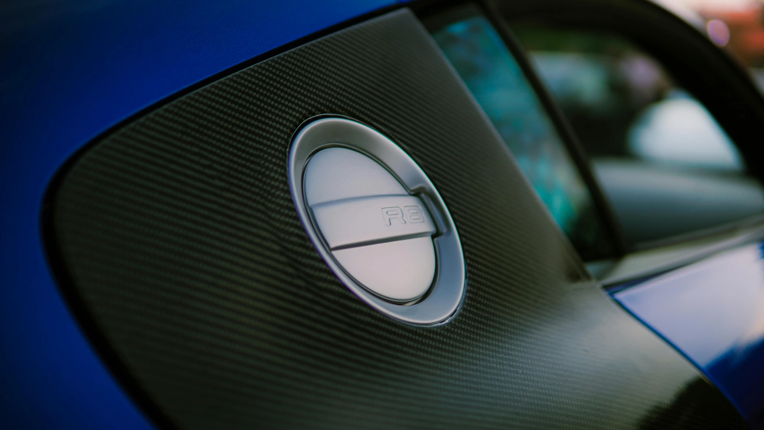 the inside of a blue car with a on control