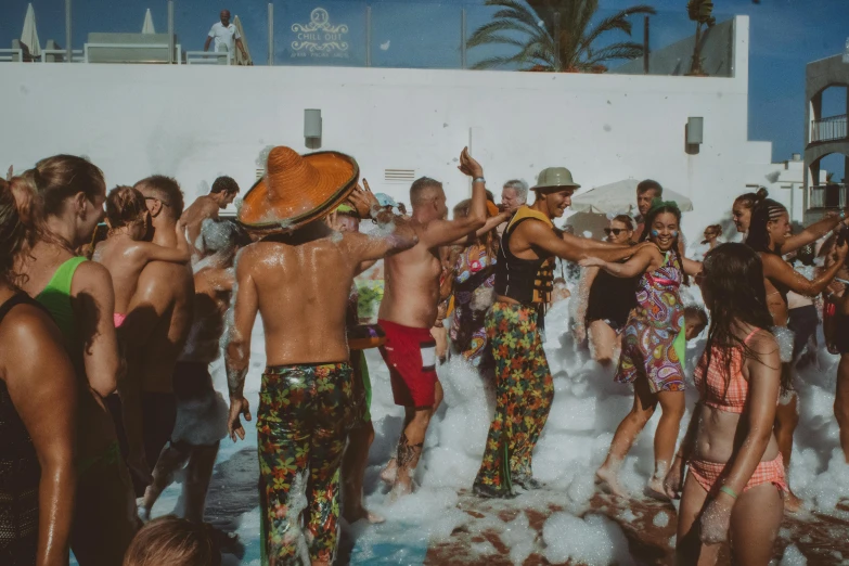 group of people having fun on the beach