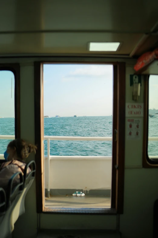 a woman lying on a train in the ocean