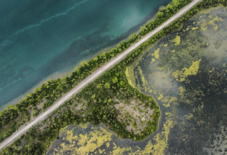 the aerial po shows an island next to the ocean