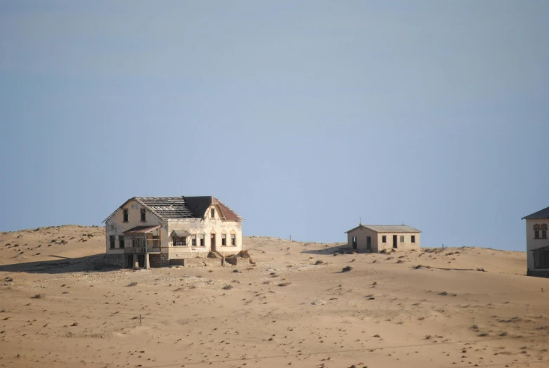 a couple of houses in the middle of nowhere