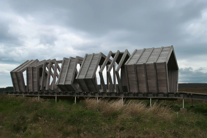 a large truck has a building made out of wood