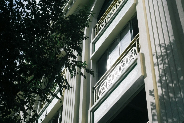 the facade of a building with balconies and a balcony