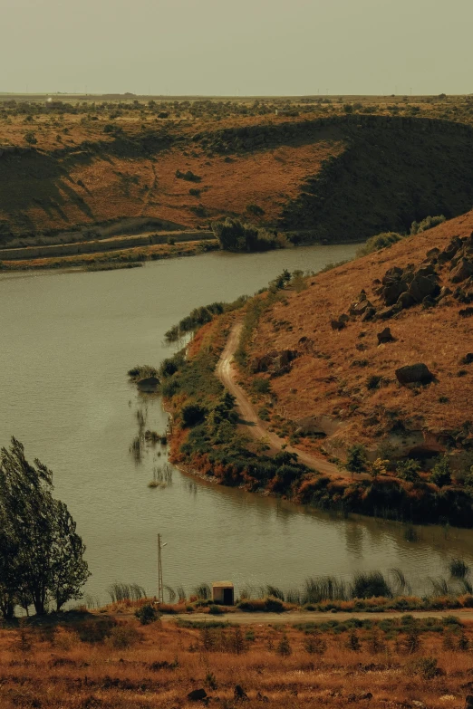 a large body of water in a countryside