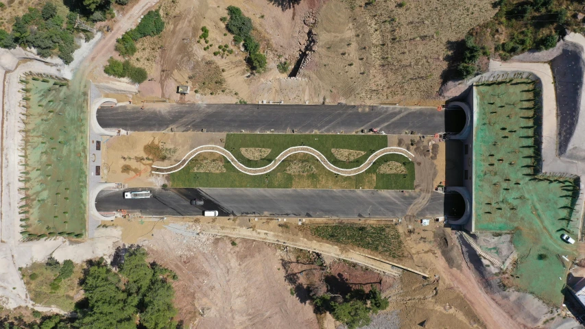 an aerial view of a park and two road