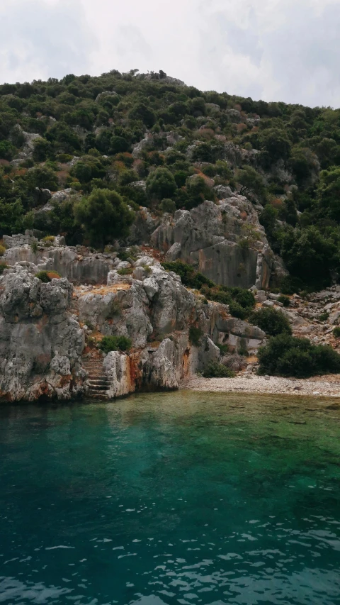 the mountain is behind a large body of water