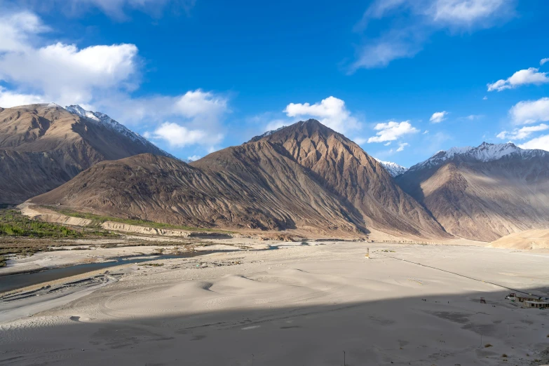 mountains and a river can be seen in this po