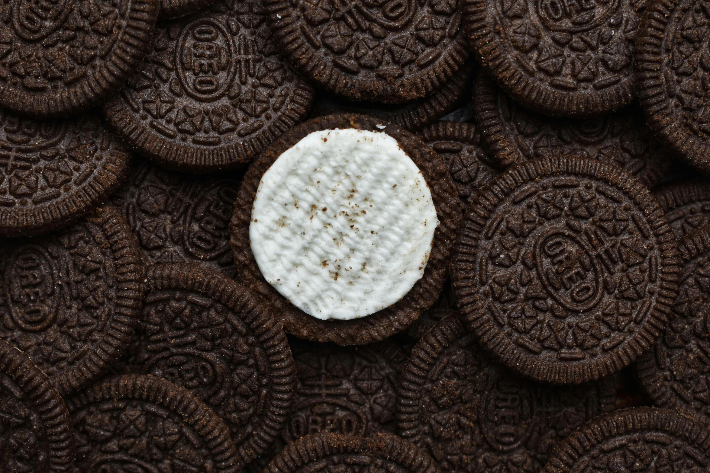 a oreo cookie with a bite taken out of it