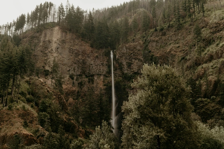 an image of a mountain with a waterfall