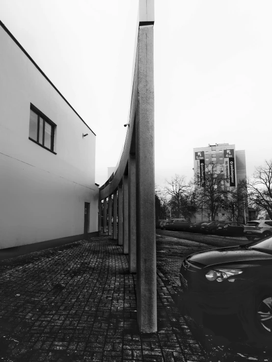 the black and white po shows a building with a clock tower