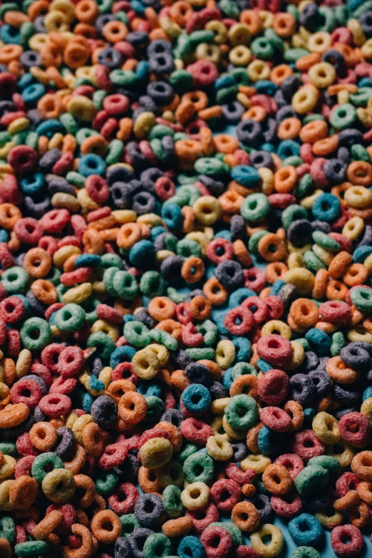 a multicolored bowl with many cereal krispy kreme cereal sprinkles