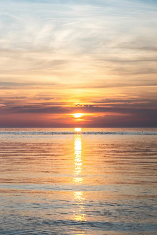 a view of a sunset over the ocean