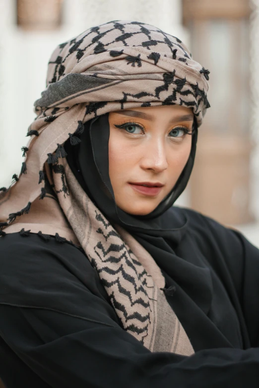 a woman with a black shirt is posing for a picture