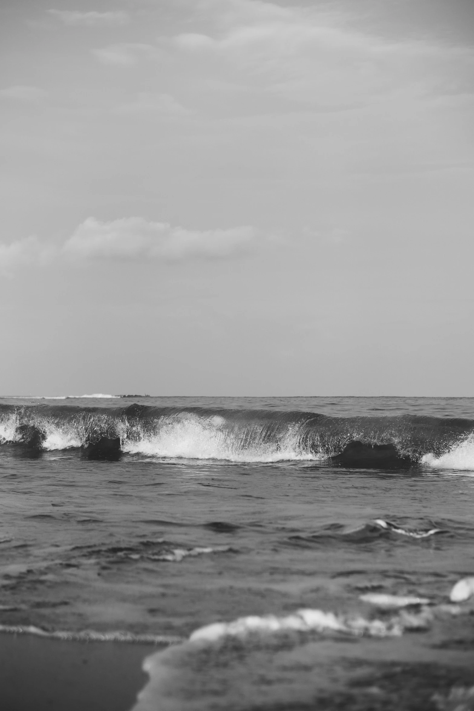 someone surfing on a sunny day in the water