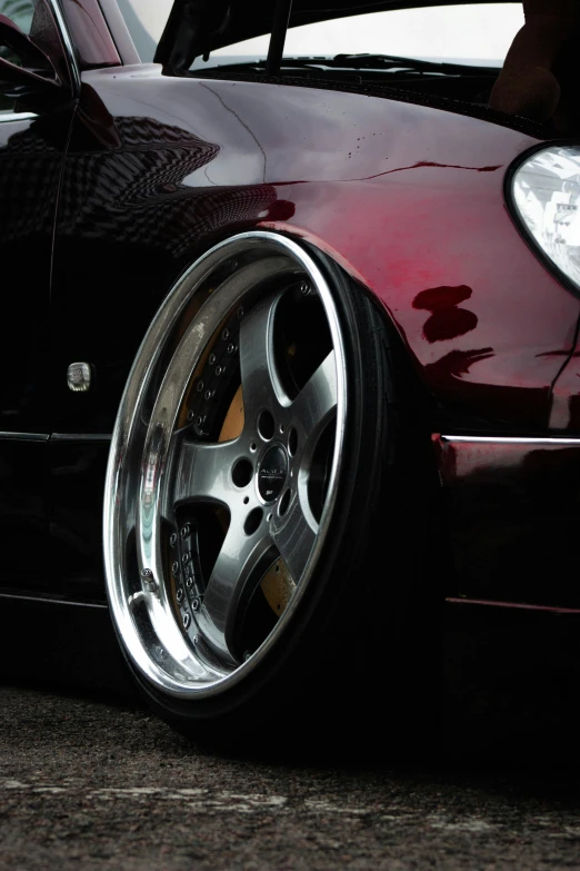 the front wheel of a car on a road