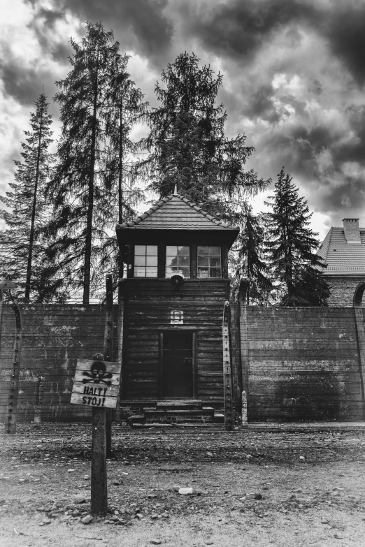 black and white po of a gazebo with a cloudy sky