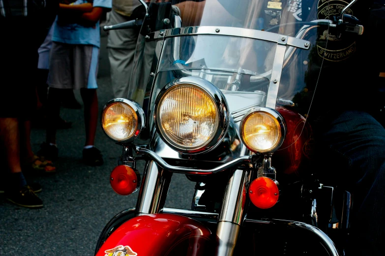 the front light of a motor bike at a festival