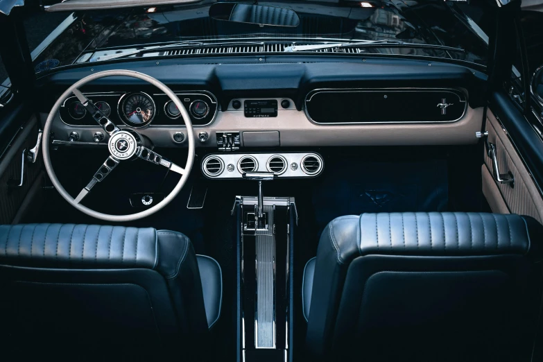 view of the dashboard, dash and dashboard wheel of a car