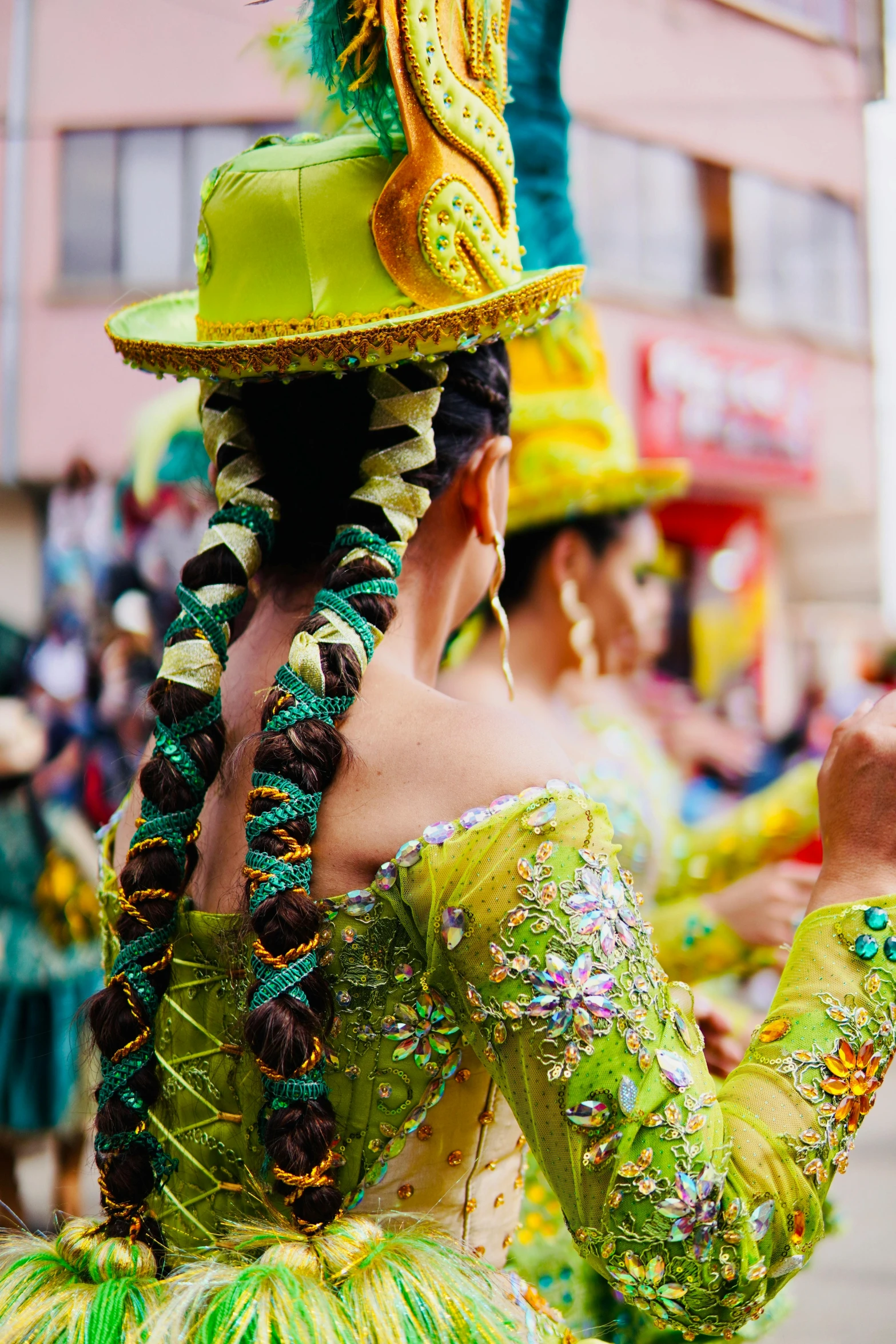 two women are dressed up in colorful clothing