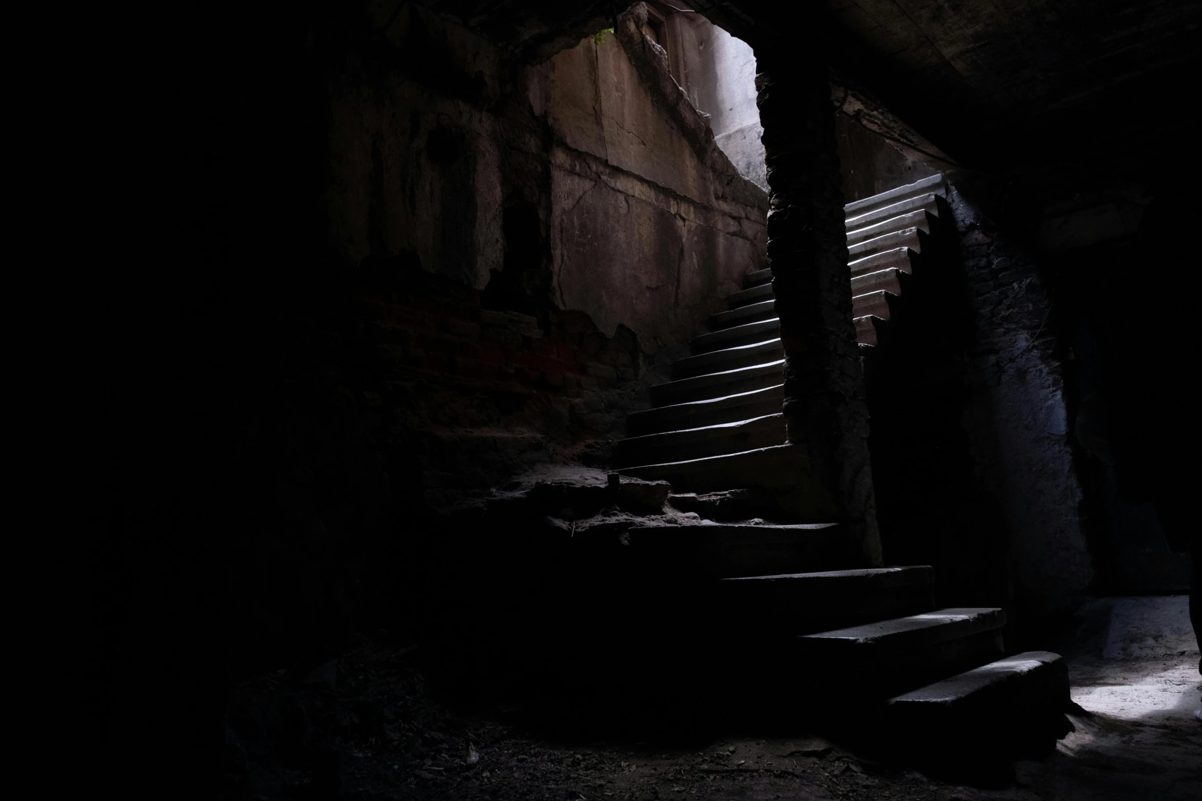 some stairs lit up in a dark room