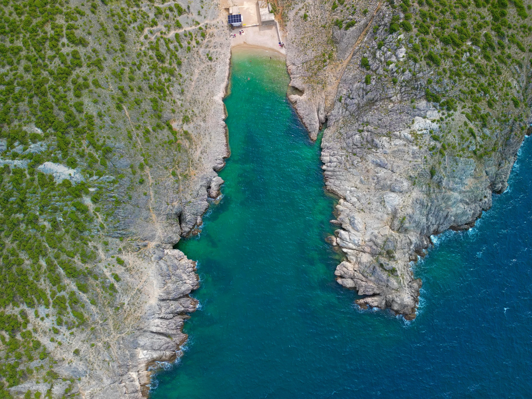 an image of aerial view of a boat dock from above