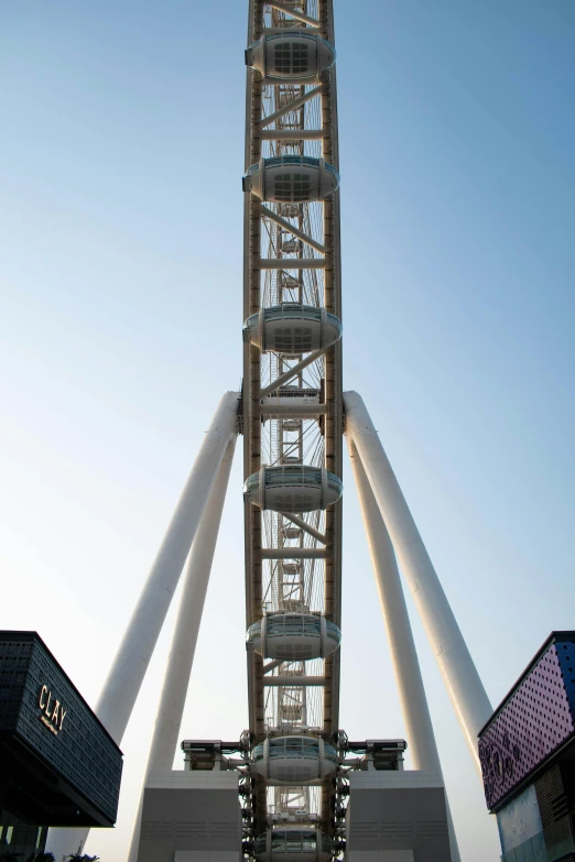 a ferris wheel that is sitting high in the sky