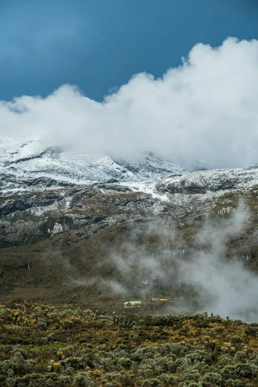 steaming air from below of white mountains and clouds