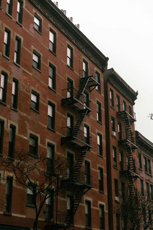 a fire escape from a building with a stairway leading to a second story