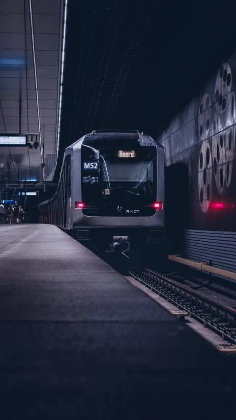 the front end of a train traveling at night