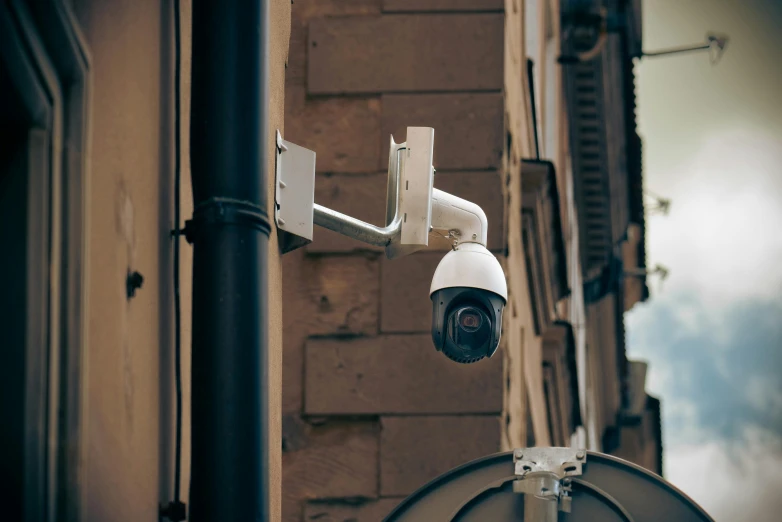 an external view of a building with an open security camera on the outside