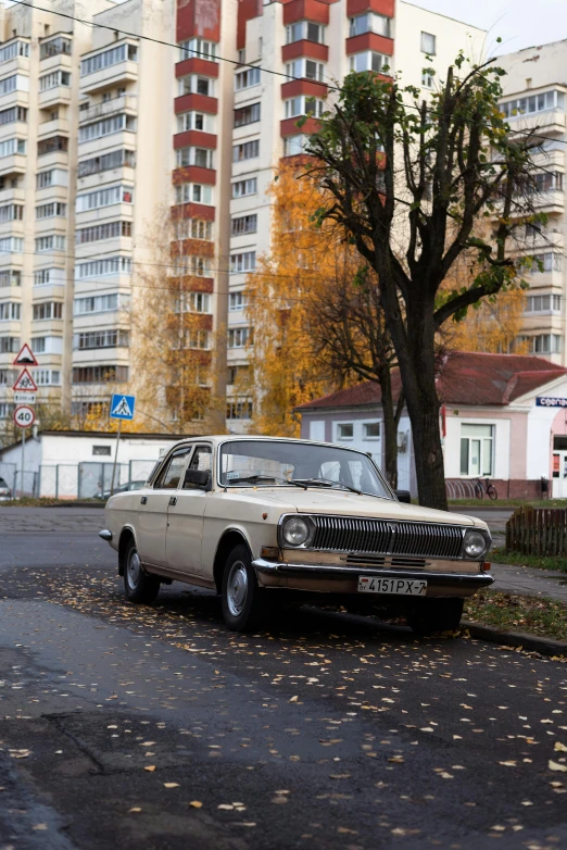 an old car on the side of a road