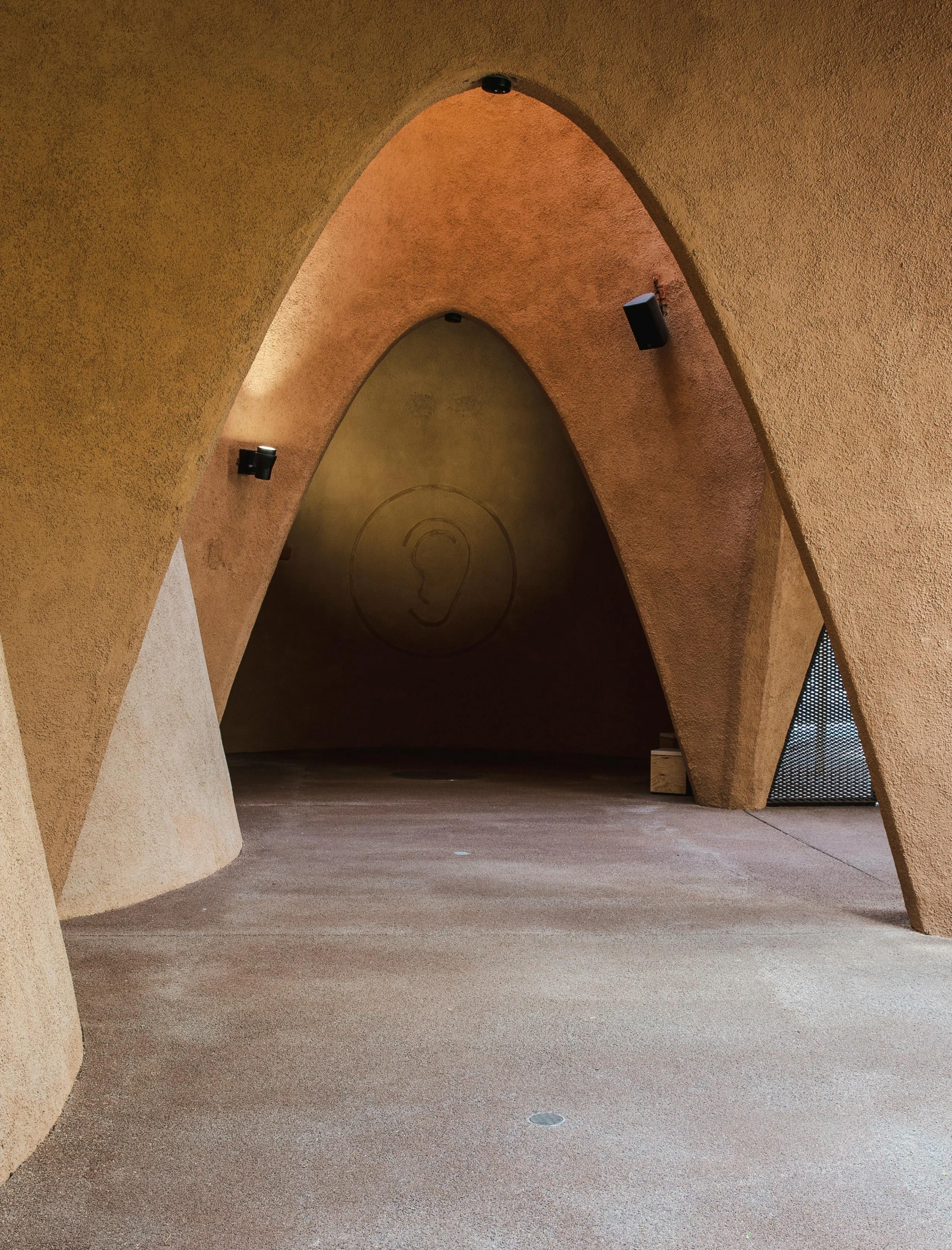 the entrance to an underground walkway in a large building