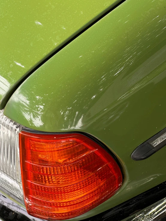 a close up s of a green car