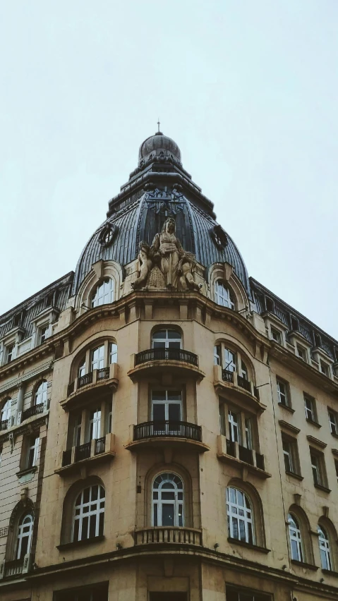 the view from the street of a building and it's roof