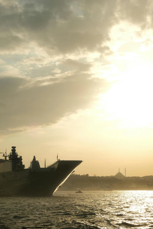 a large cargo ship traveling in the ocean